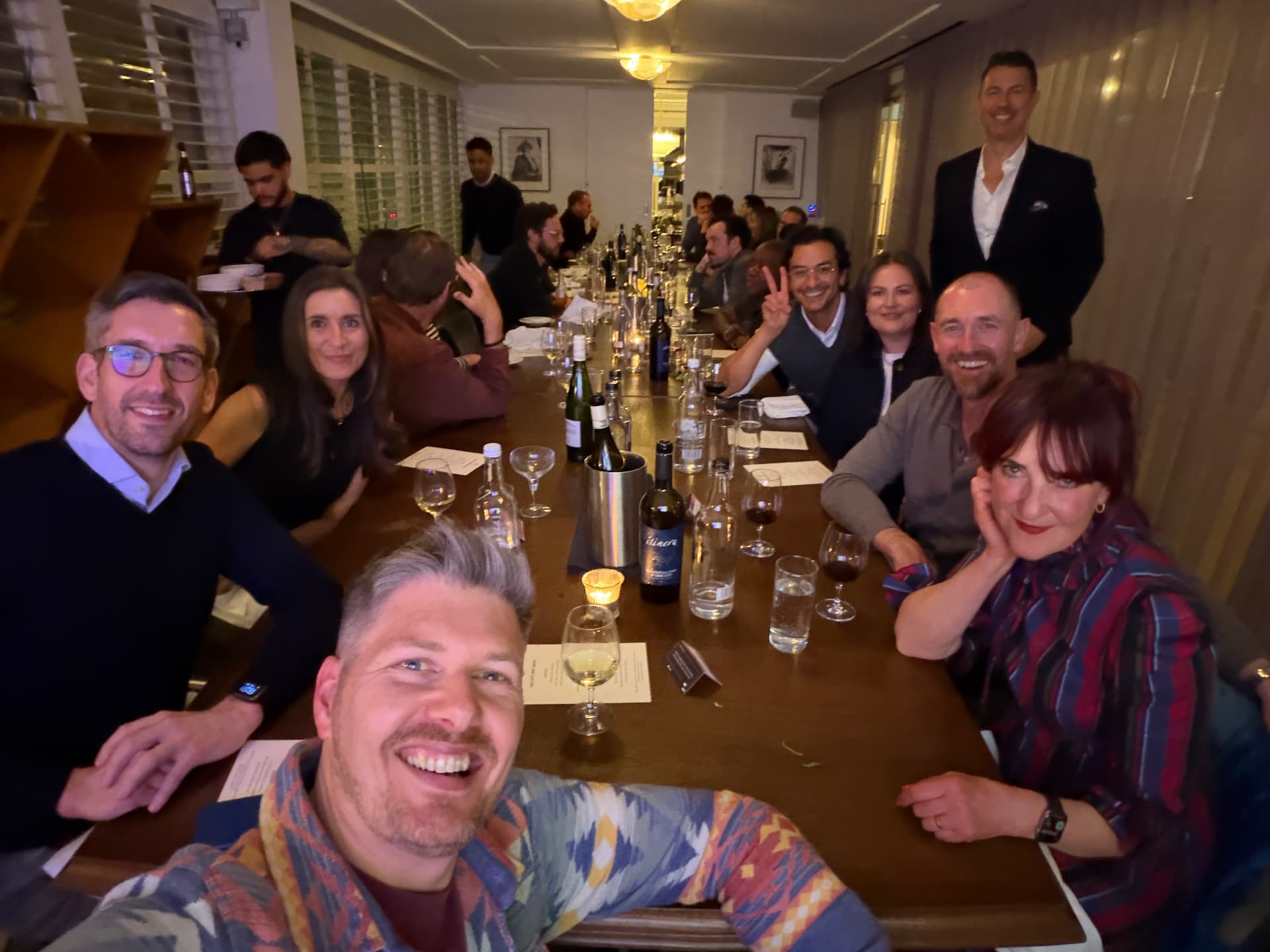 Provocateurs' Dinner guests together around the table